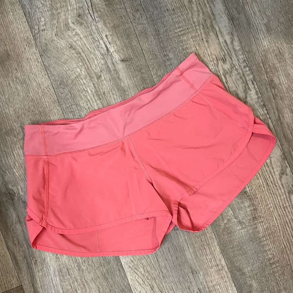 Pink Lululemon running shorts